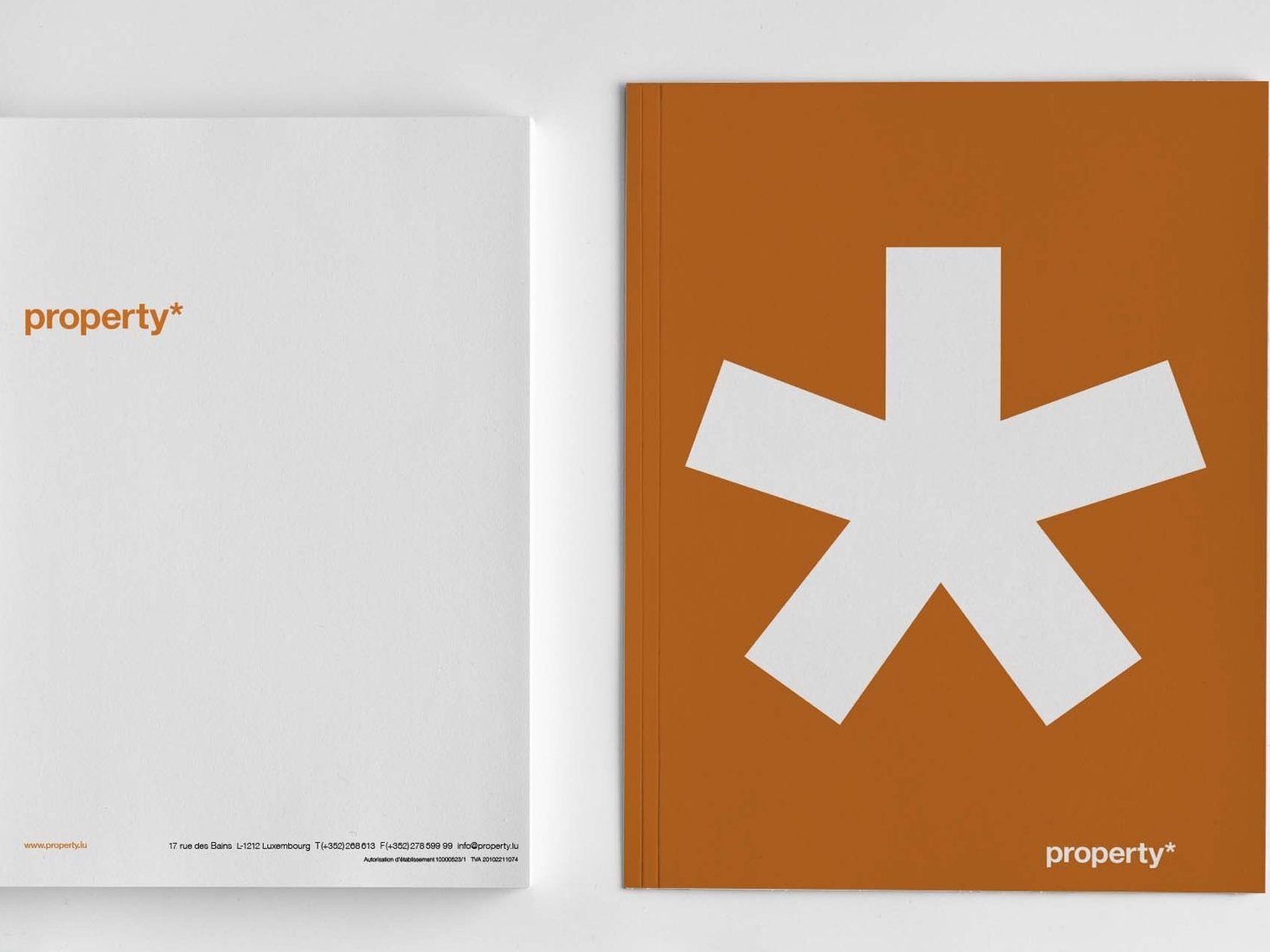 property* letterhead and an orange folder with a large white asterisk